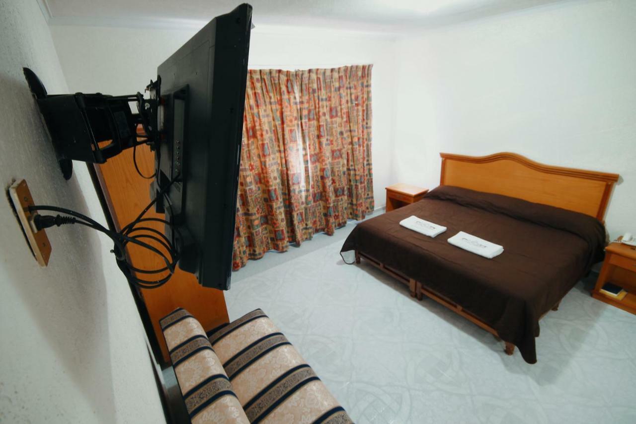 Hotel El Conquistador Monarca. Zitacuaro ภายนอก รูปภาพ