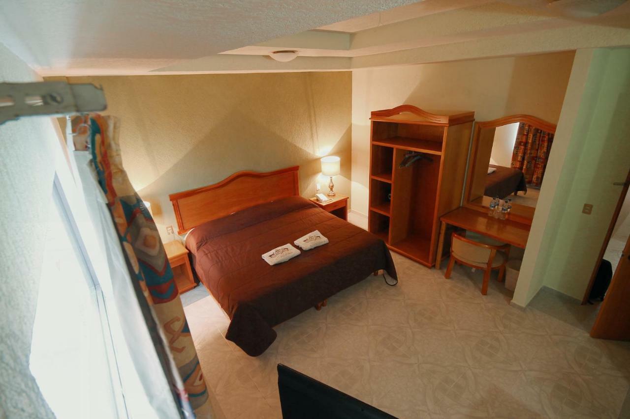 Hotel El Conquistador Monarca. Zitacuaro ภายนอก รูปภาพ