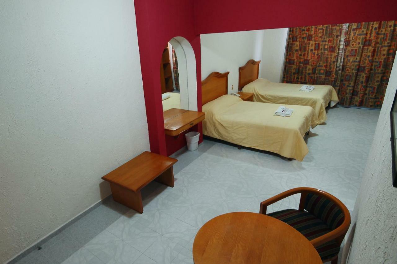 Hotel El Conquistador Monarca. Zitacuaro ภายนอก รูปภาพ